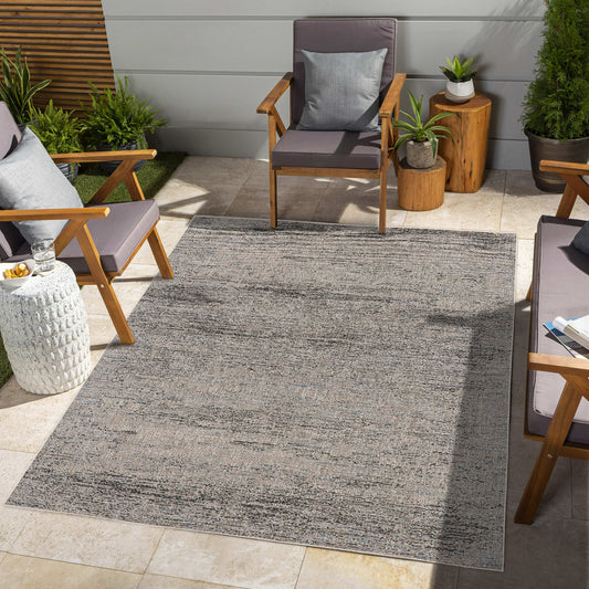 Naira Distressed Solid Modern Grey and Blue Indoor Rug