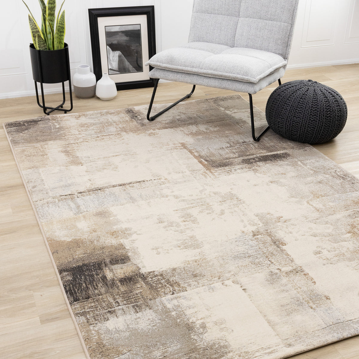 Tapis contemporain crème à motifs géométriques vieillis