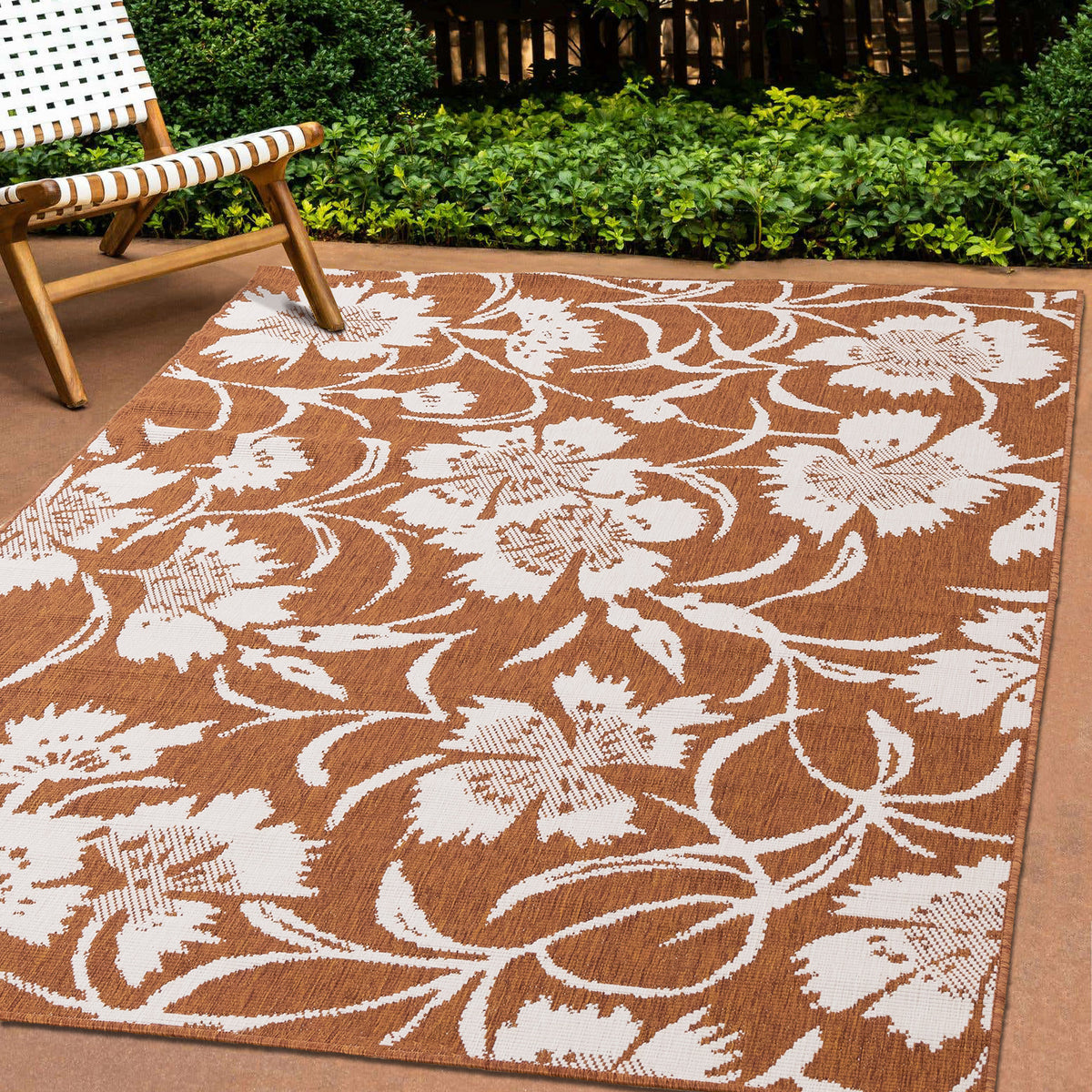 Tapis contemporain à motifs botaniques orange