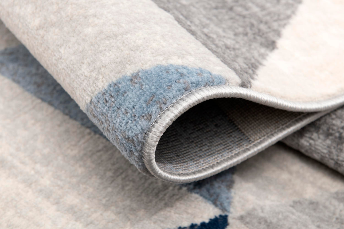 Tapis Eldin géométrique contemporain bleu