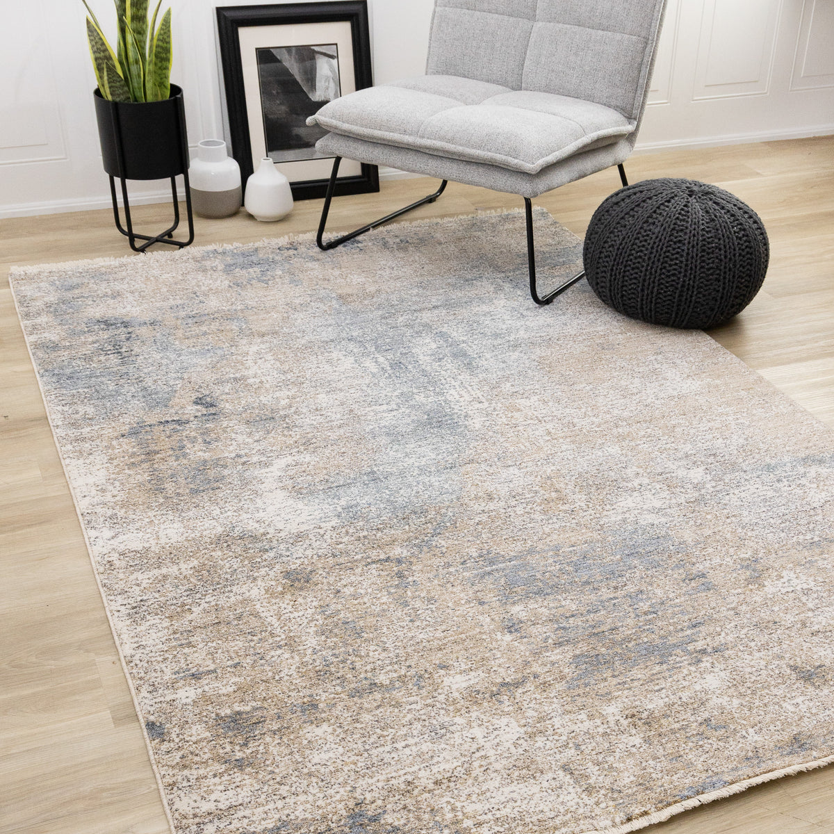 Tapis contemporain beige à motifs géométriques vieillis