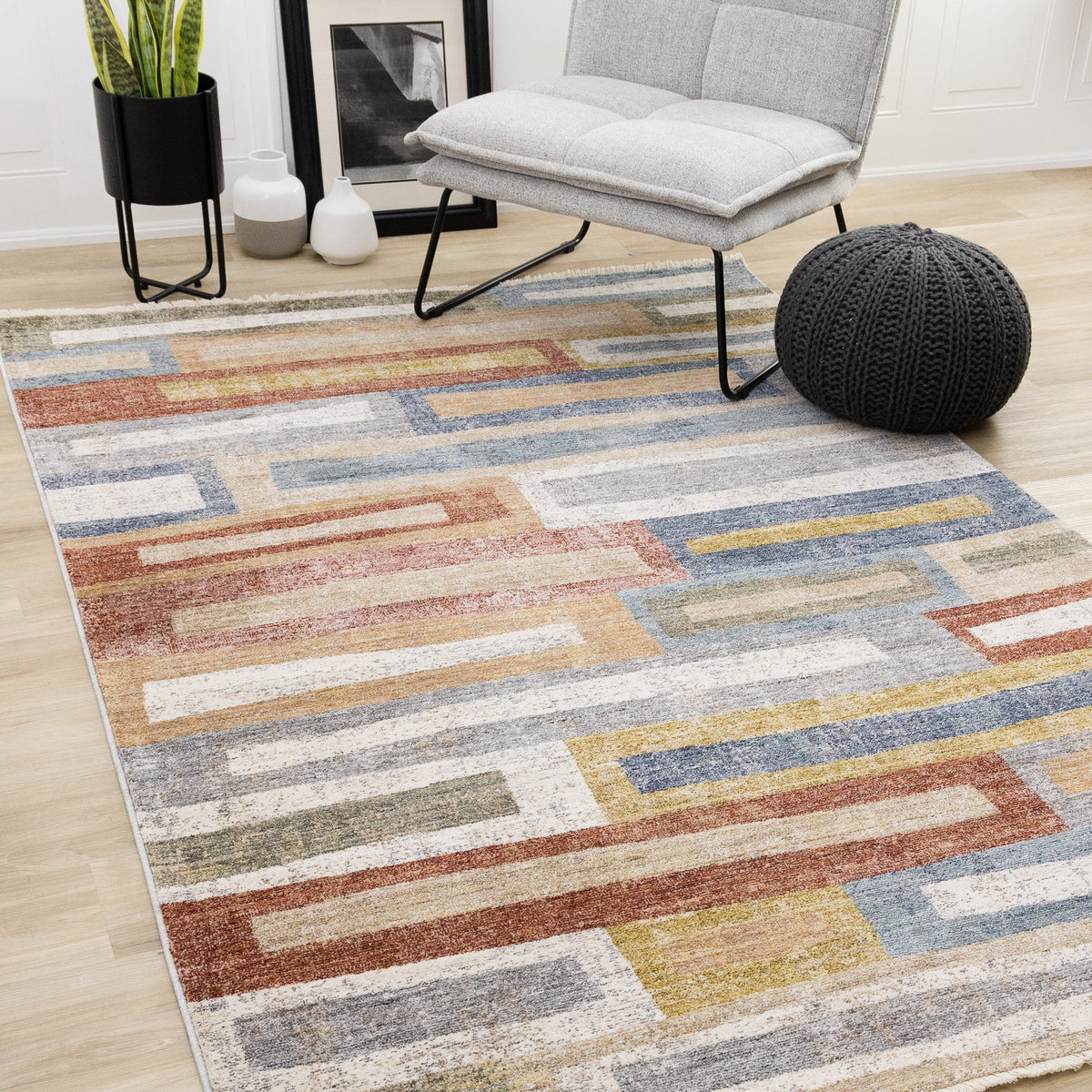 Tapis contemporain à motifs géométriques orange vieillis
