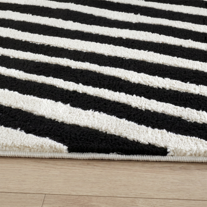 Alfombra Domus con estampado de cebra moderna en blanco y negro