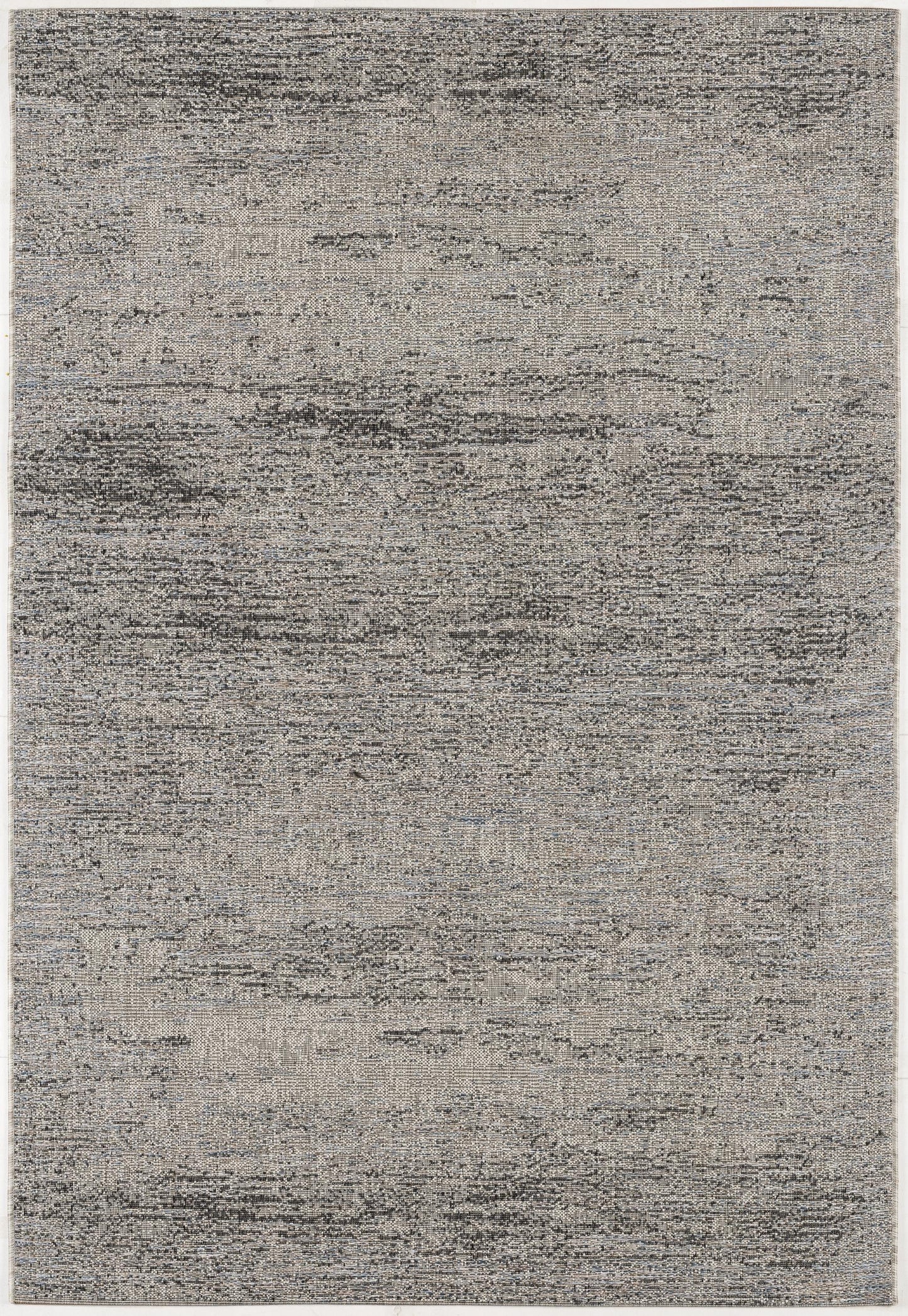 Naira Distressed Solid Modern Grey and Blue Indoor Rug