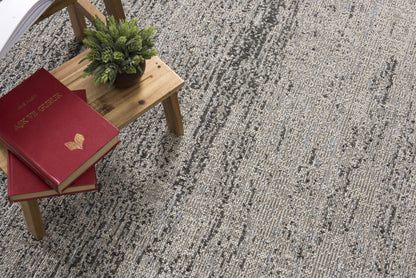 Naira Distressed Solid Modern Grey and Blue Indoor Rug