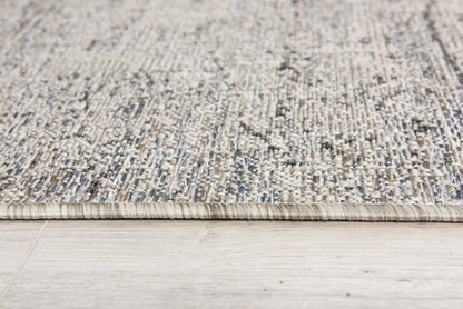 Naira Distressed Solid Modern Grey and Blue Indoor Rug