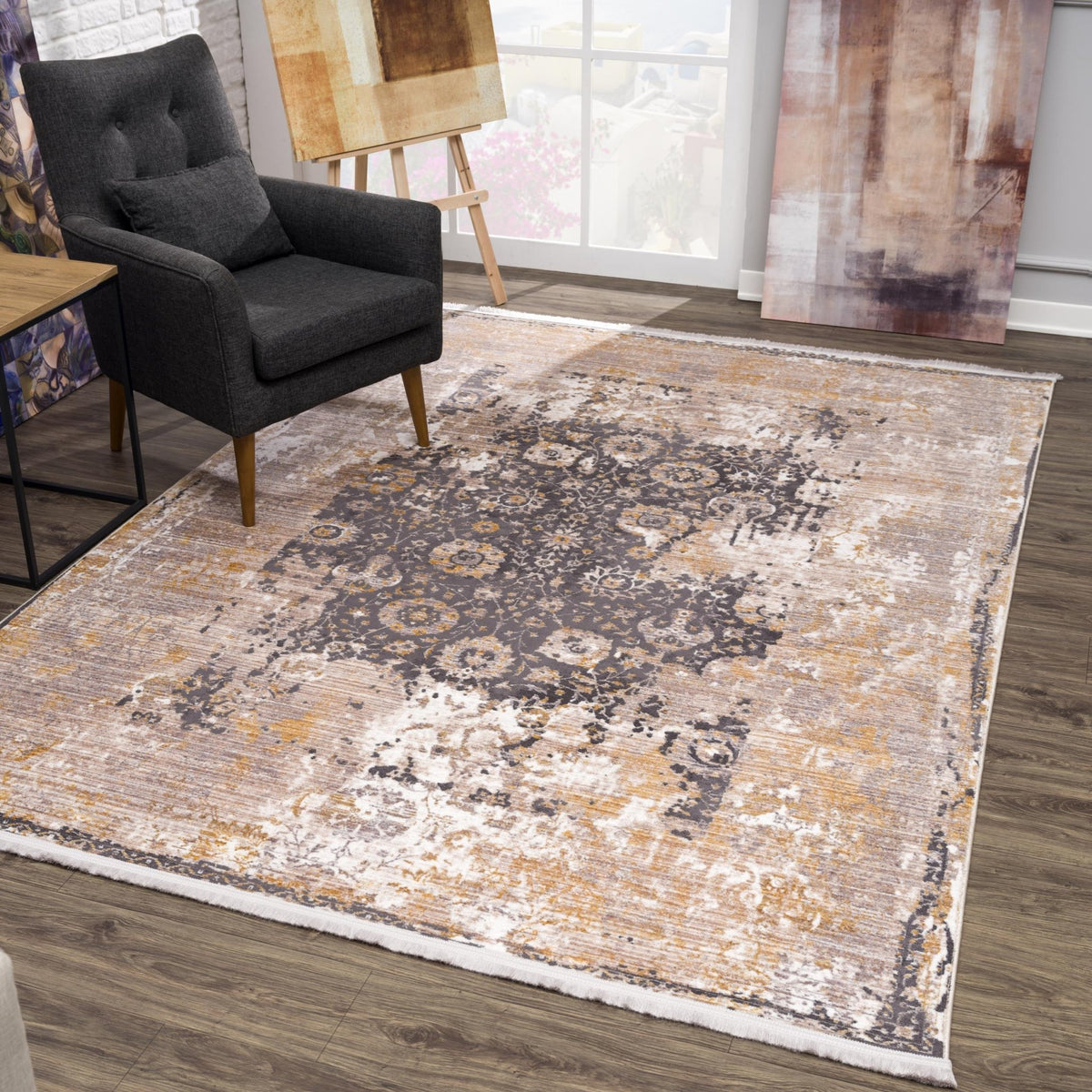 Alfombra de interior gris y beige transicional Paletta con medallón envejecido