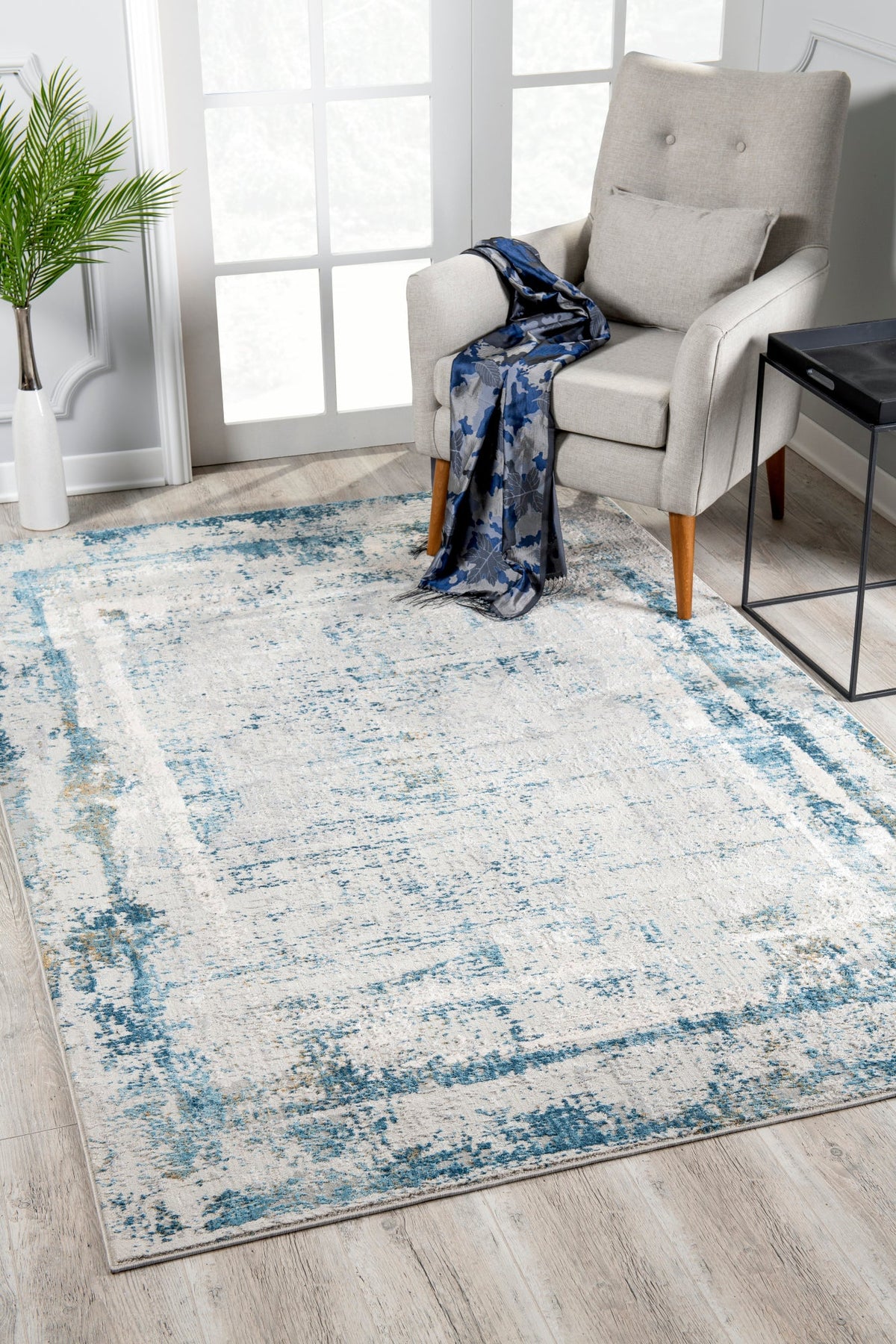 Tapis bleu contemporain abstrait Mirage